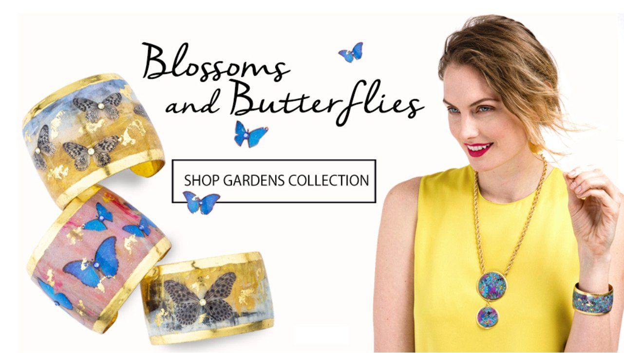 Woman with short hair and a yellow top smiling and watching butterflies