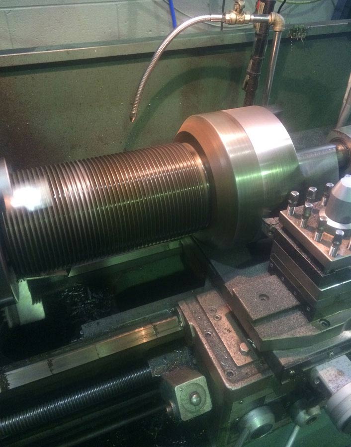 machine part being cleaned