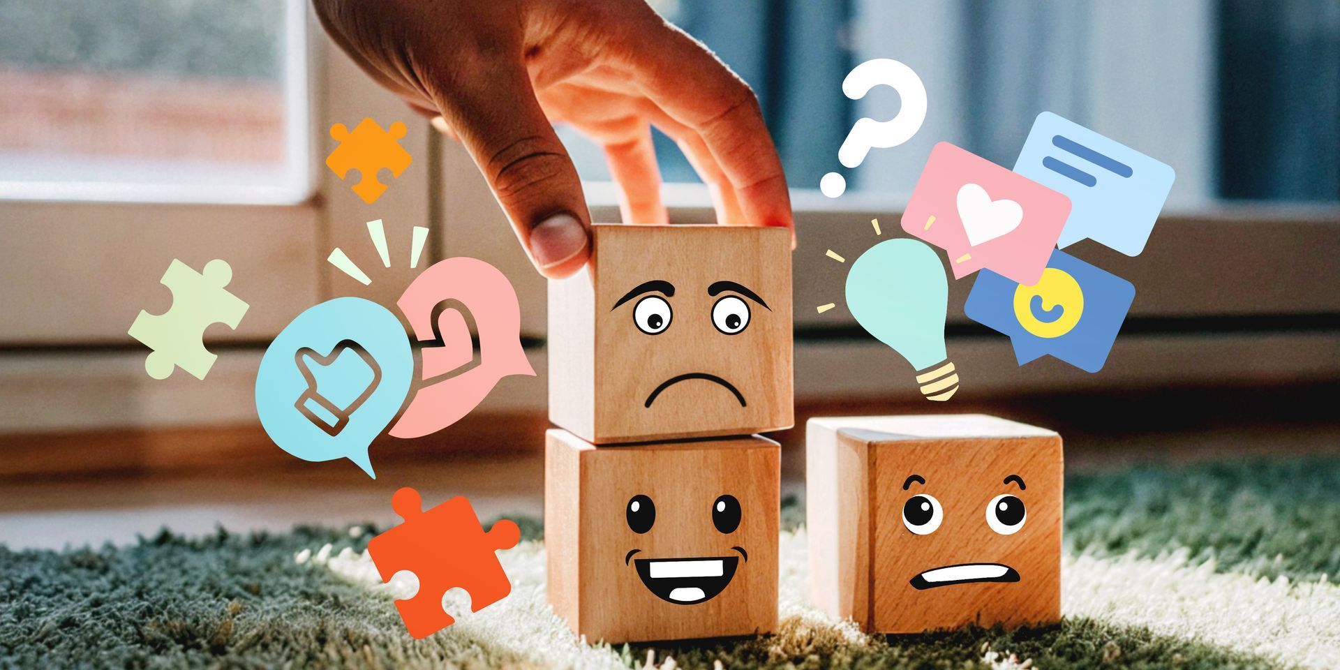 Hand stacking blocks with different facial expressions to represent emotional and behavior control. Hand stacking blocks with different facial expressions to represent emotional and behavior control.
