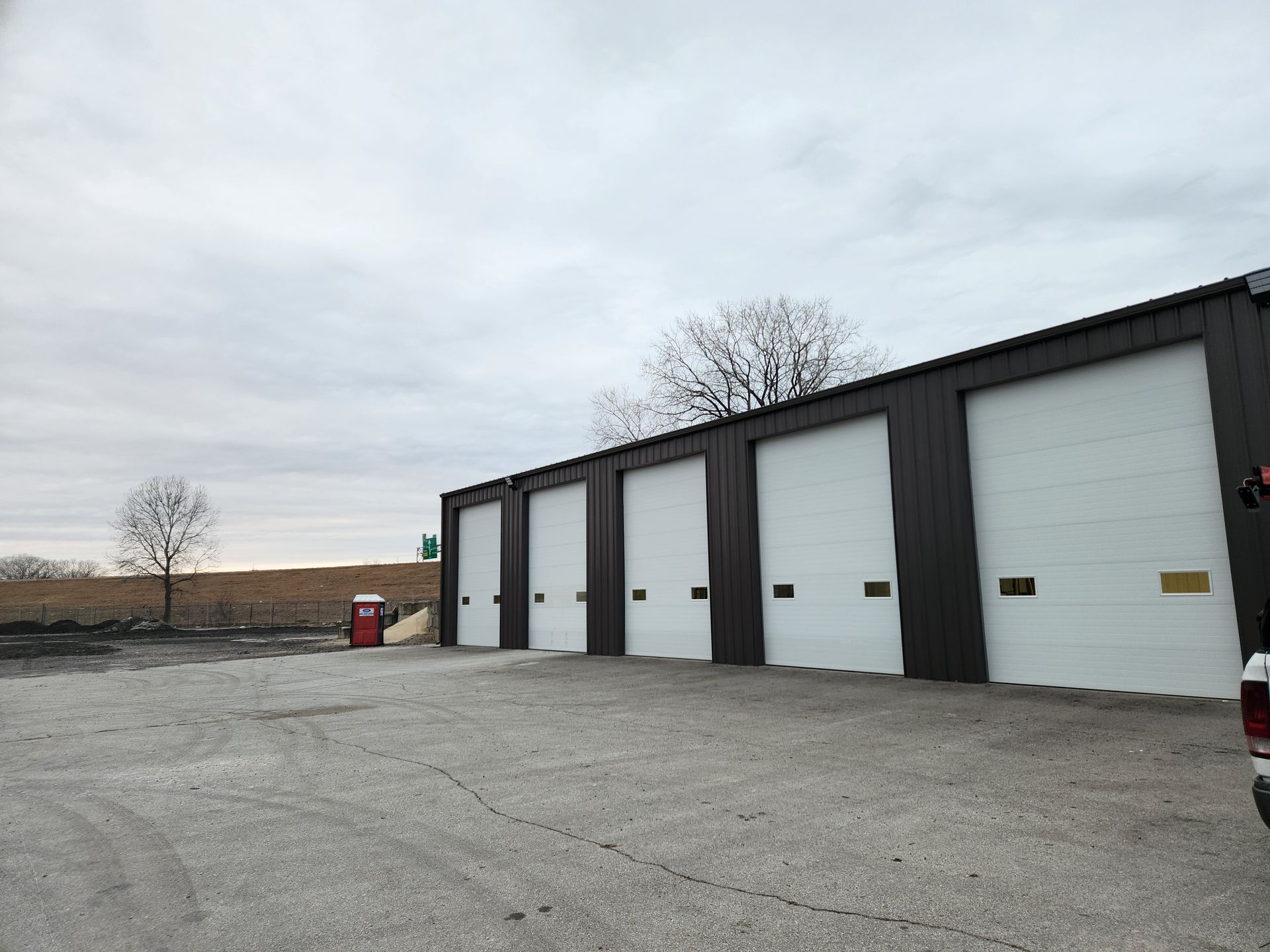 Nice Row of Loading Dock Doors — Peculiar, MO — Dock Pros