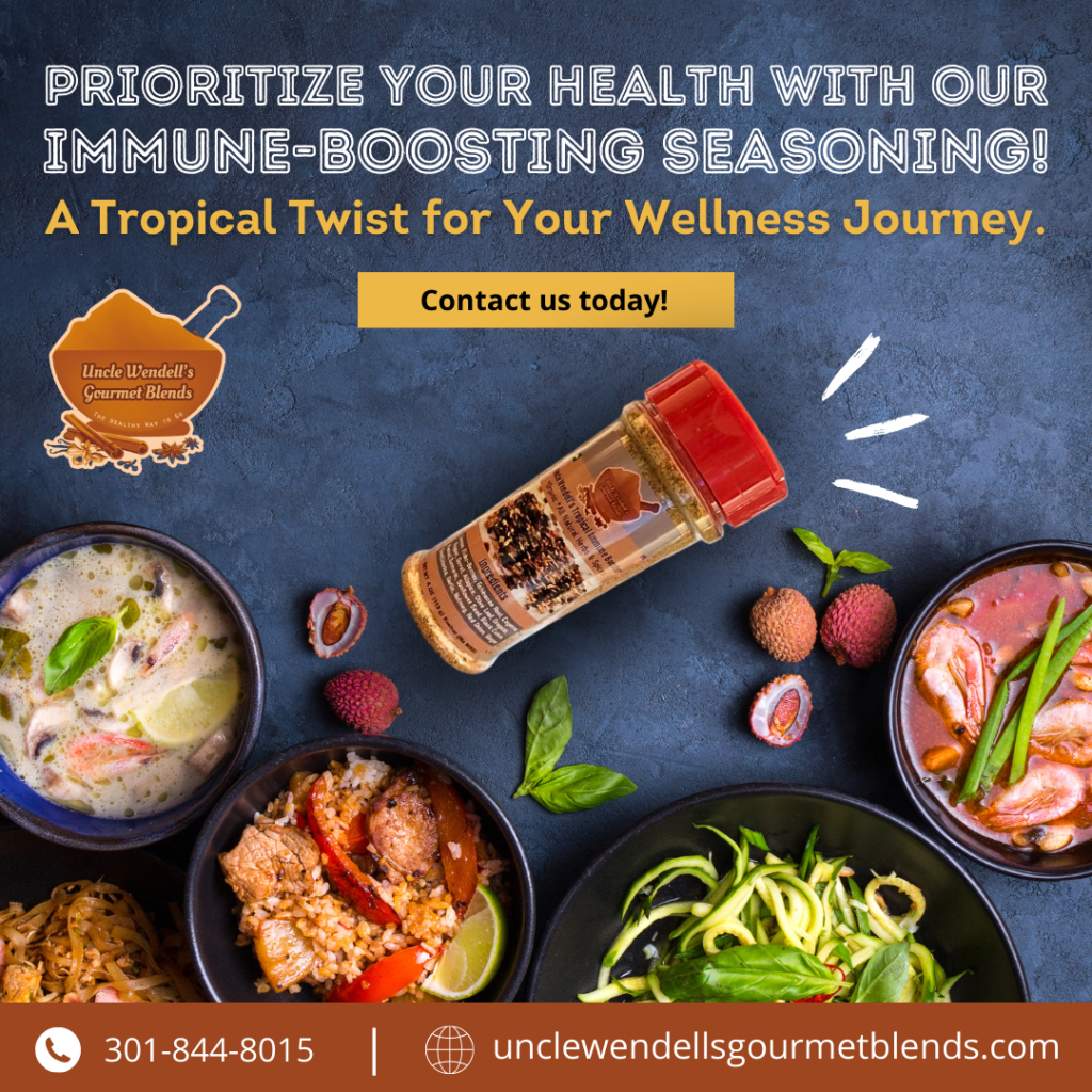 A bottle of spices sits on a table next to bowls of food.