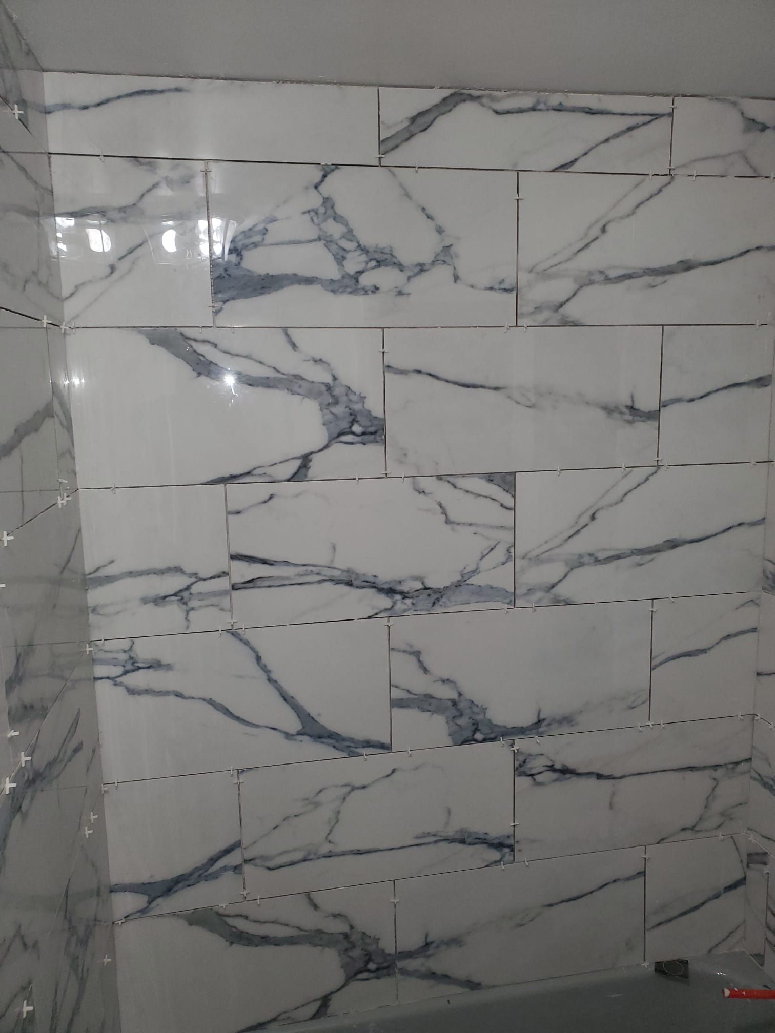 Bathroom With Sleek White Tile - Hartford, CT - Hinds