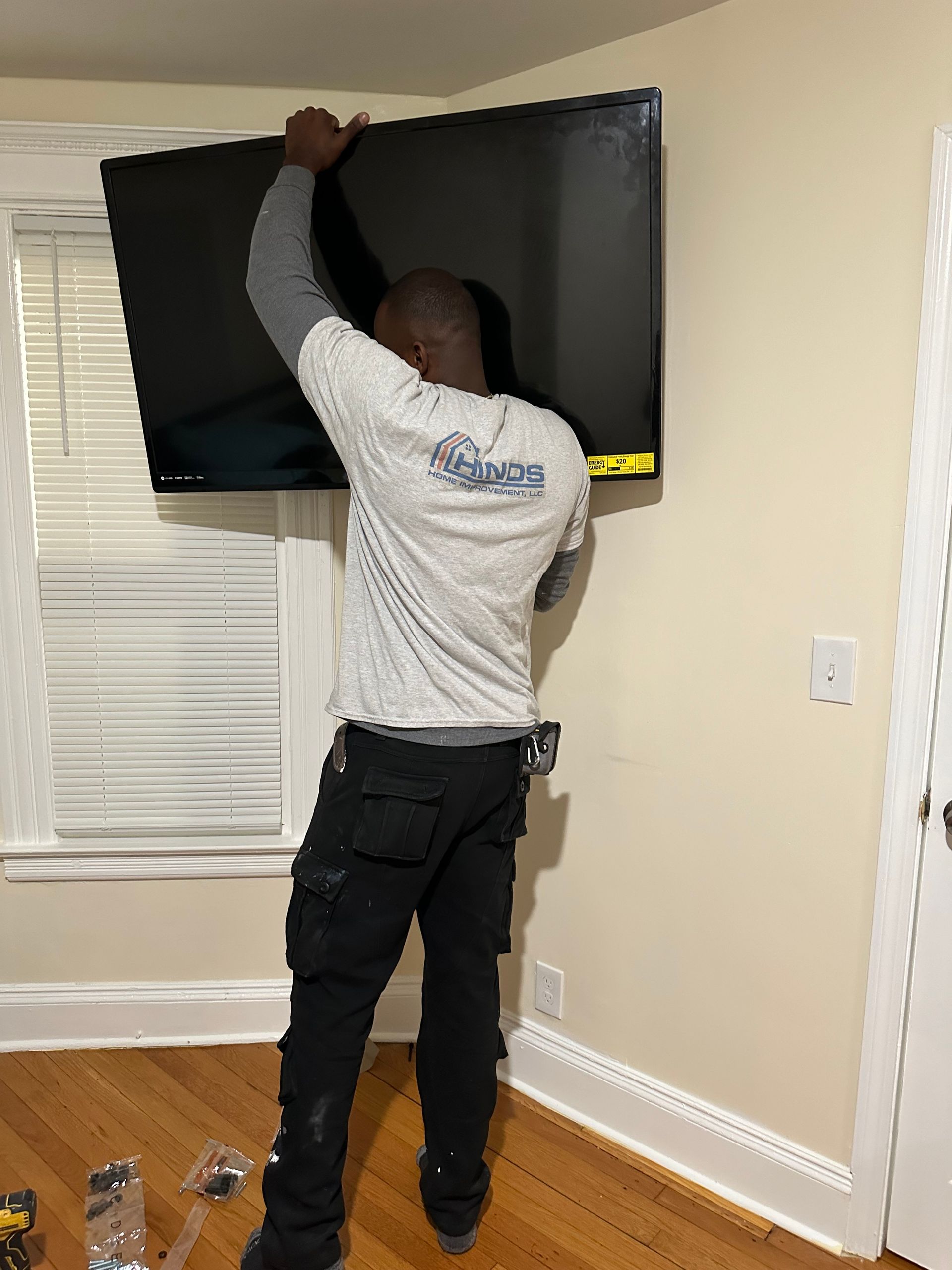 Man is carrying a television – Hartford, CT - Hinds