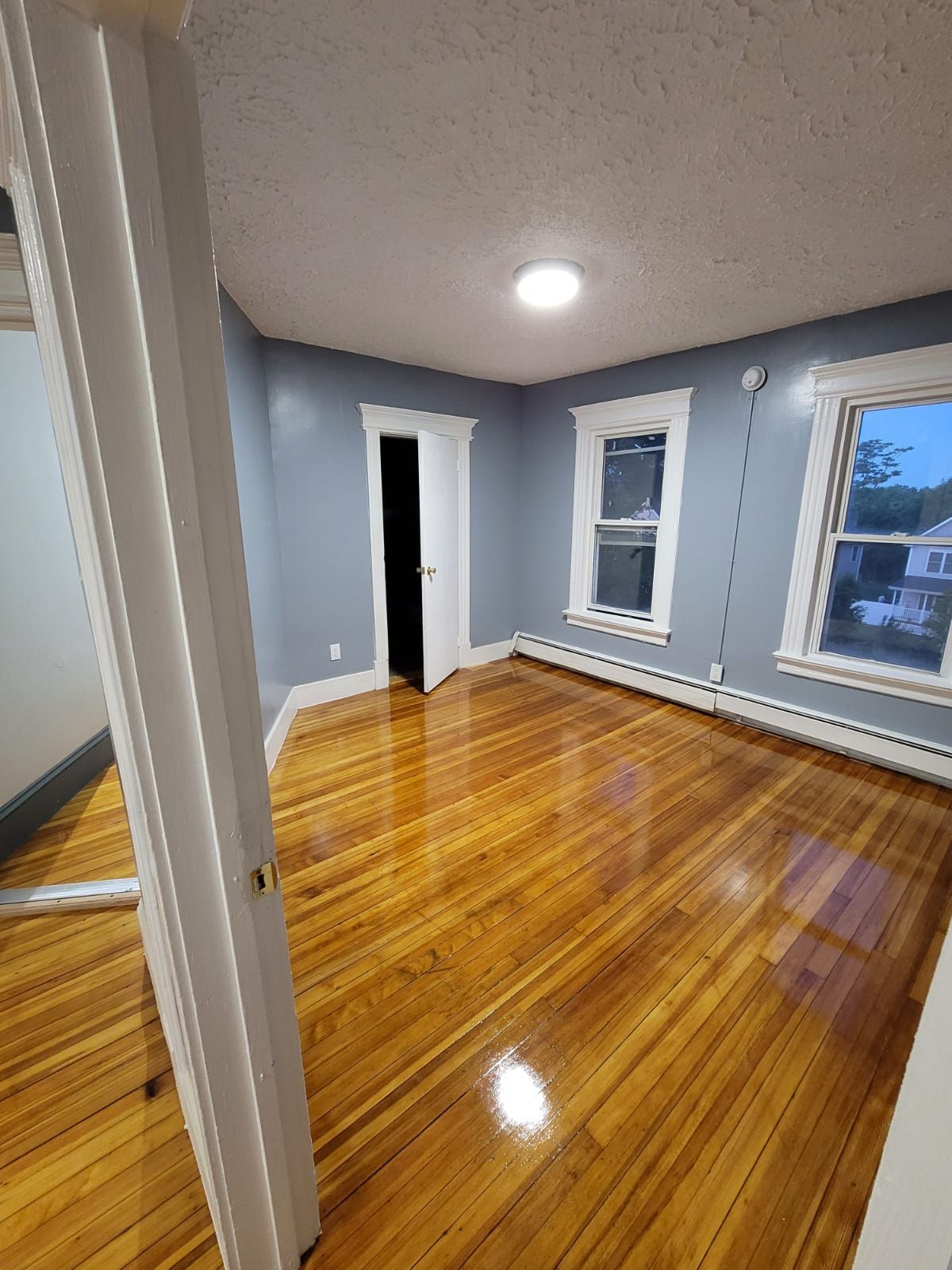 A room accented with shiny plank flooring – Hartford, CT - Hinds