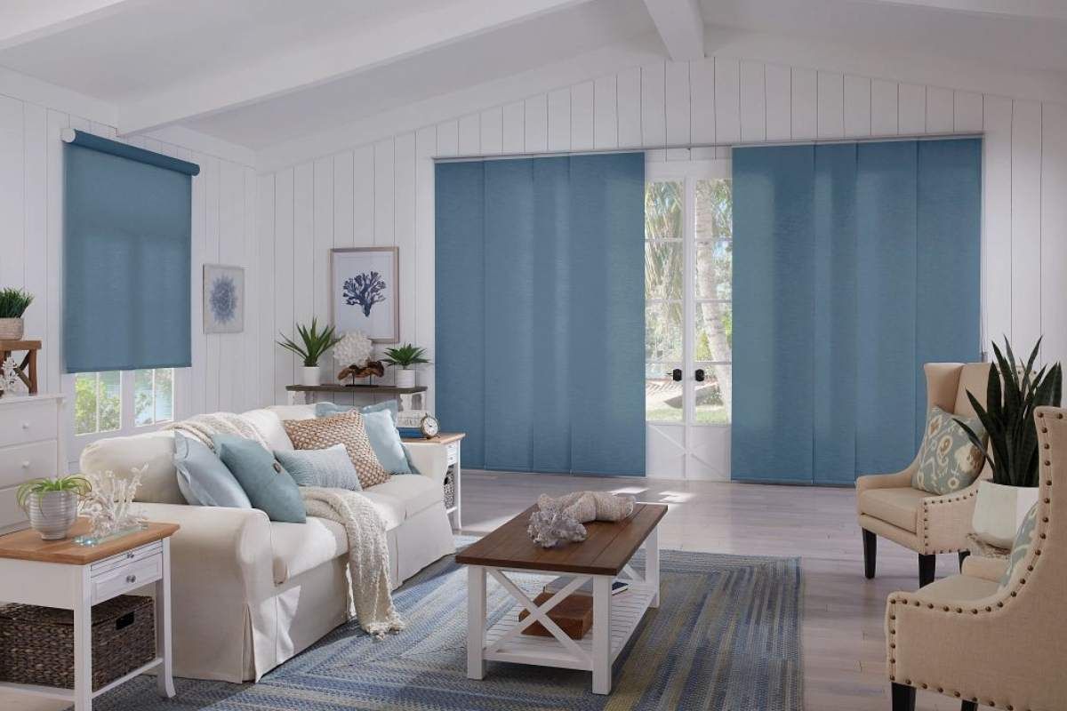 Graber® roller shades with Somfy® hanging in a home