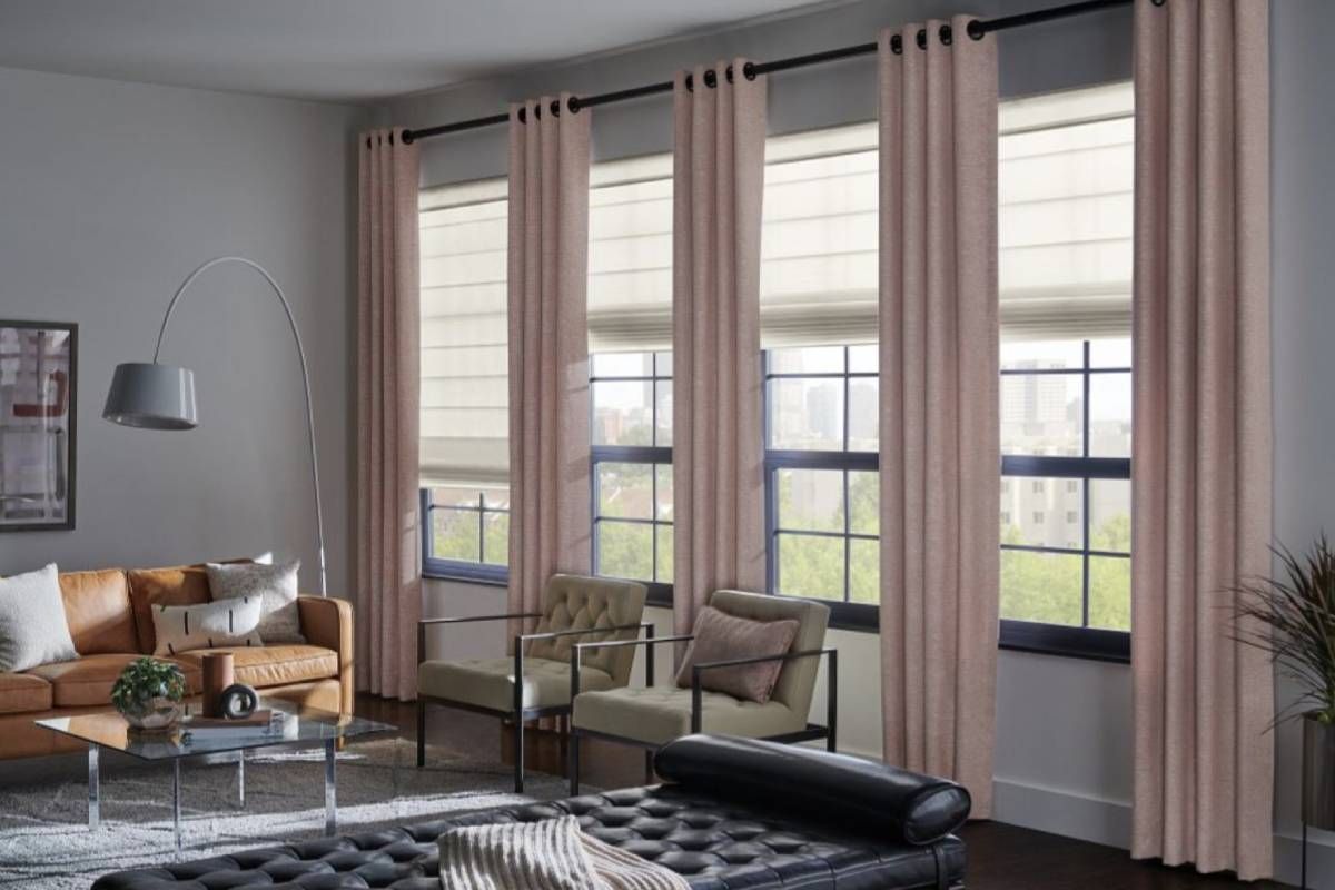 Graber® Roman Shades hanging from several windows in a beautiful home living room near Glendora, California (CA)