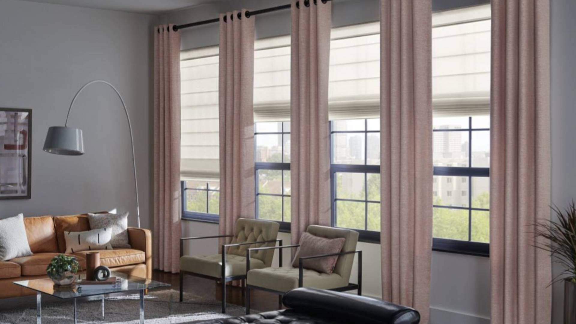 Graber® Roman Shades hanging from several windows in a beautiful home living room near Glendora, Cal