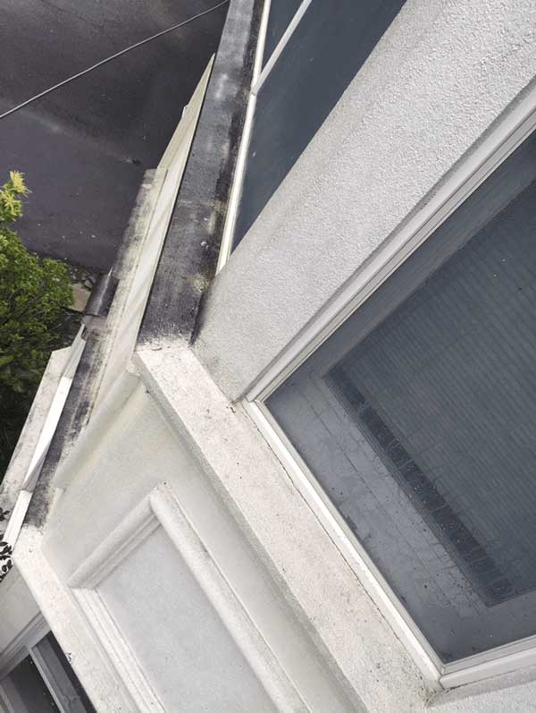 Dirt on Window Gutter — Pressure Cleaning Services in Englewood, NJ