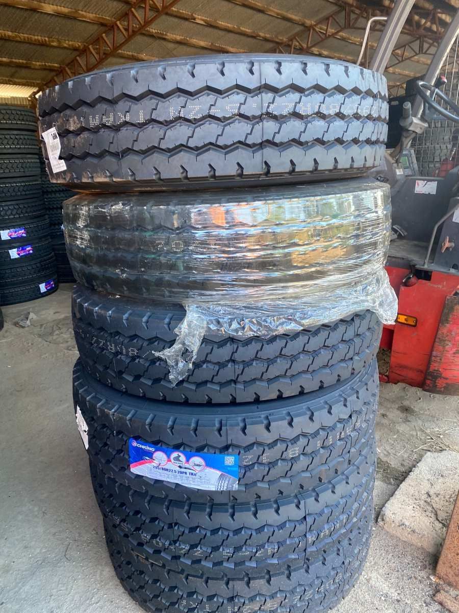A Stack Of Tires Sitting On Top Of Each Other In A Garage — Johnny Farming Company In Ooralea, QLD