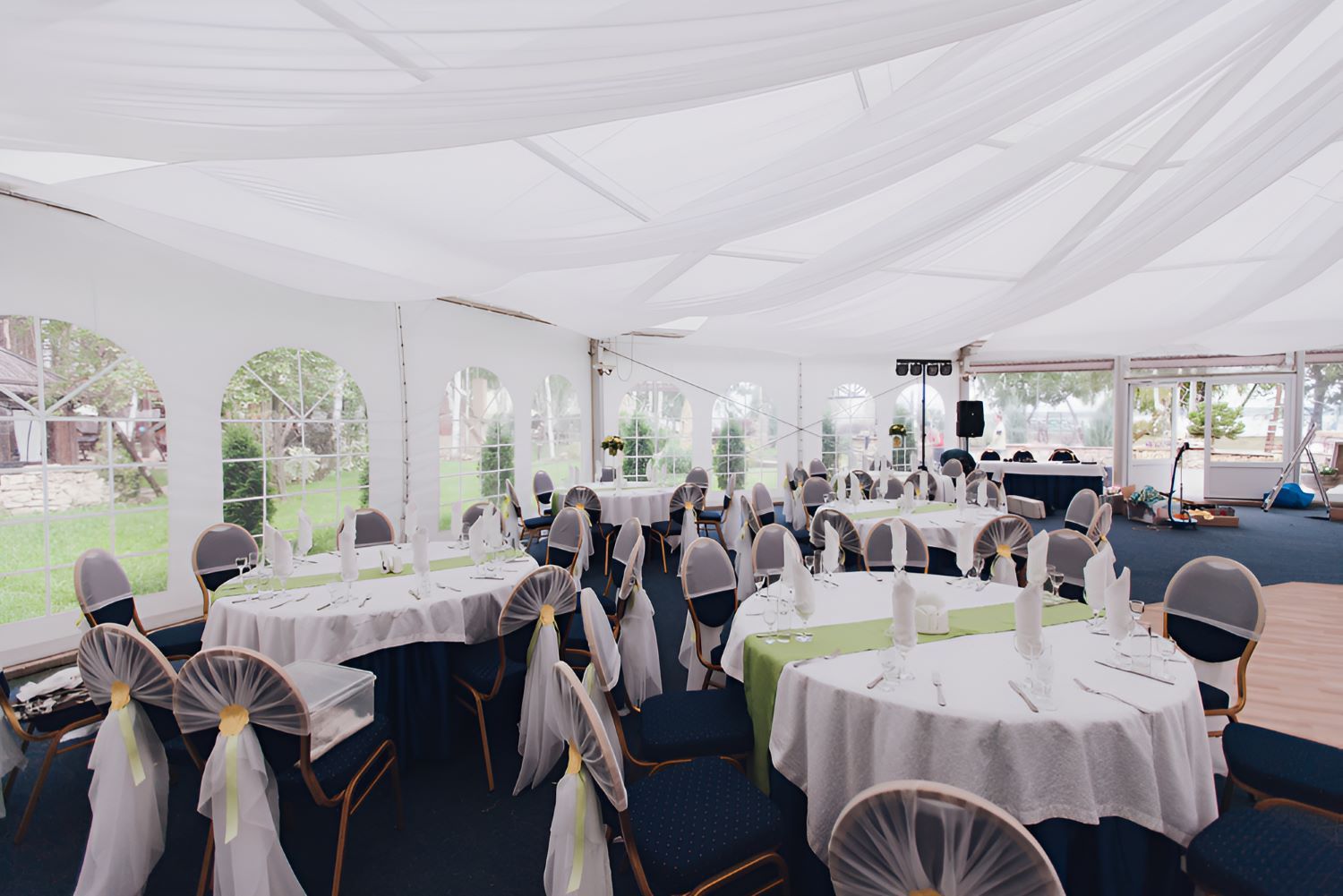 A Large Tent With Tables And Chairs Set Up For A Wedding Reception — Johnny Farming Company In Ooralea, QLD