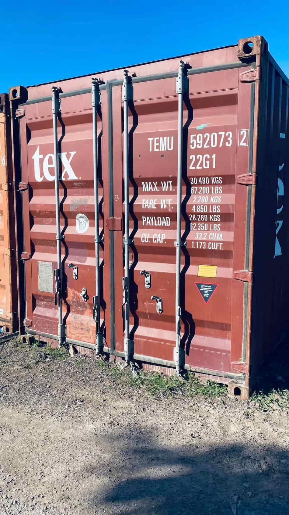 A Red Shipping Container With The Word Tex On It — Johnny Farming Company In Ooralea, QLD