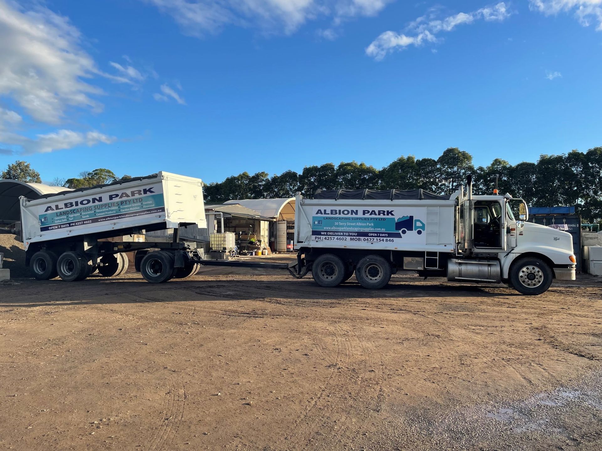 Truck and Dog — Landscaping Materials In Albion Park, NSW