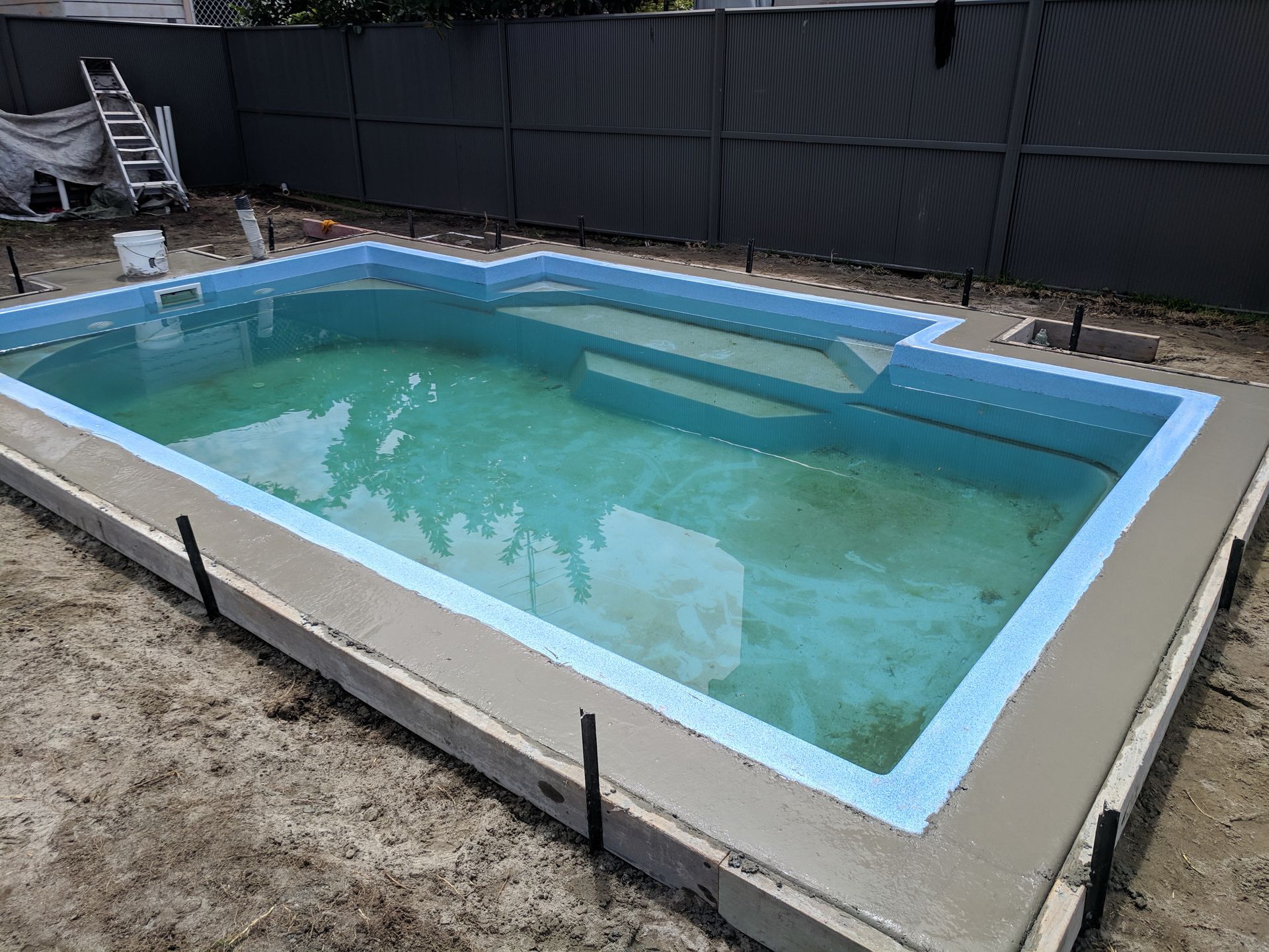 Swimming Pool Installation In Backyard — Landscaping Materials In Albion Park, NSW
