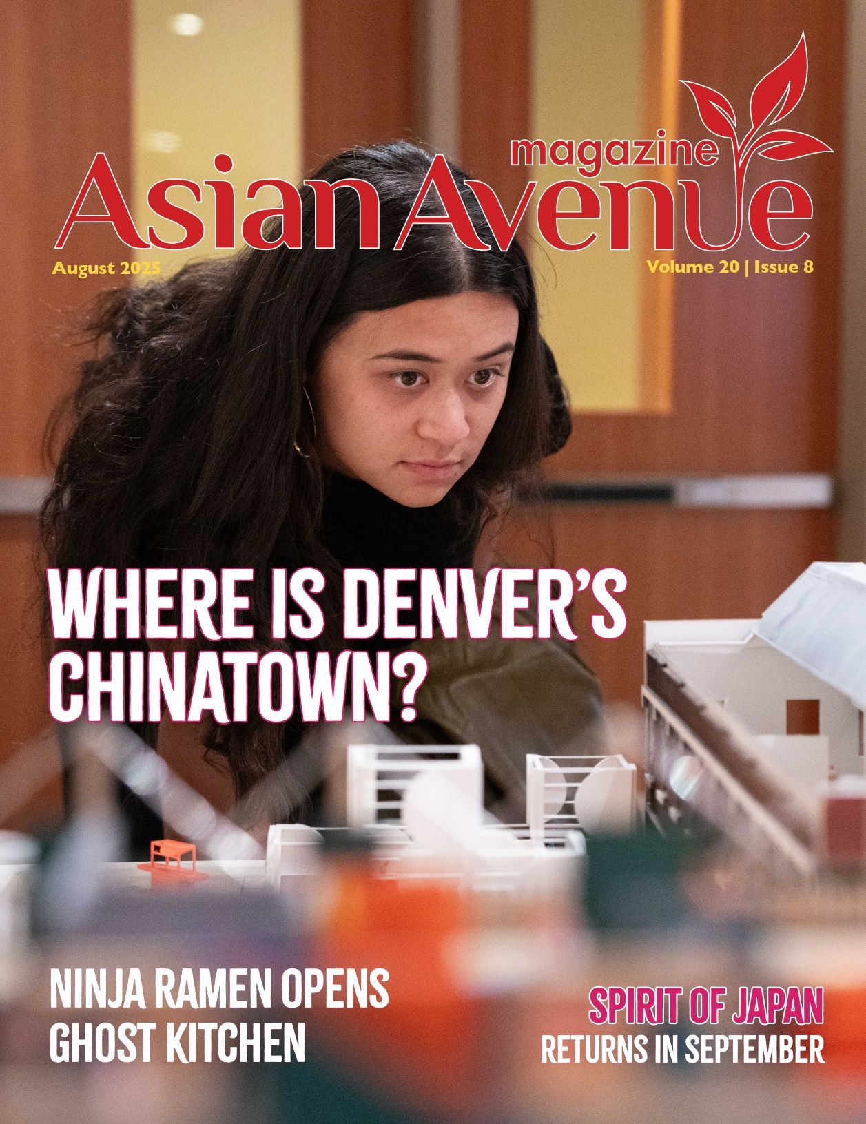 Magazine cover: woman looking at something. Title 