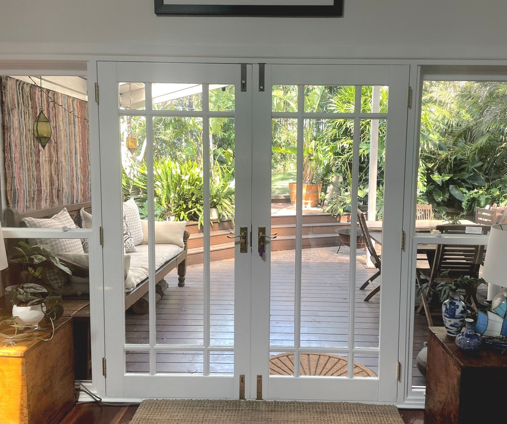 A White Sink Is Installed on Top of A Wooden Counter in A Kitchen — Tradewind Building Maintenance in Woonona,NSW
