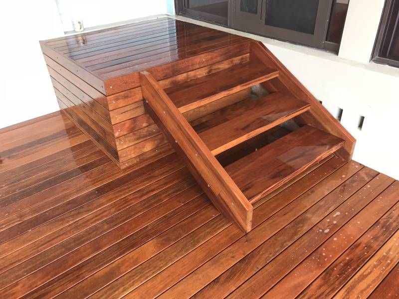 A Blue Building with A White Door and Yellow Tape Around It — Tradewind Building Maintenance in Woonona,NSW