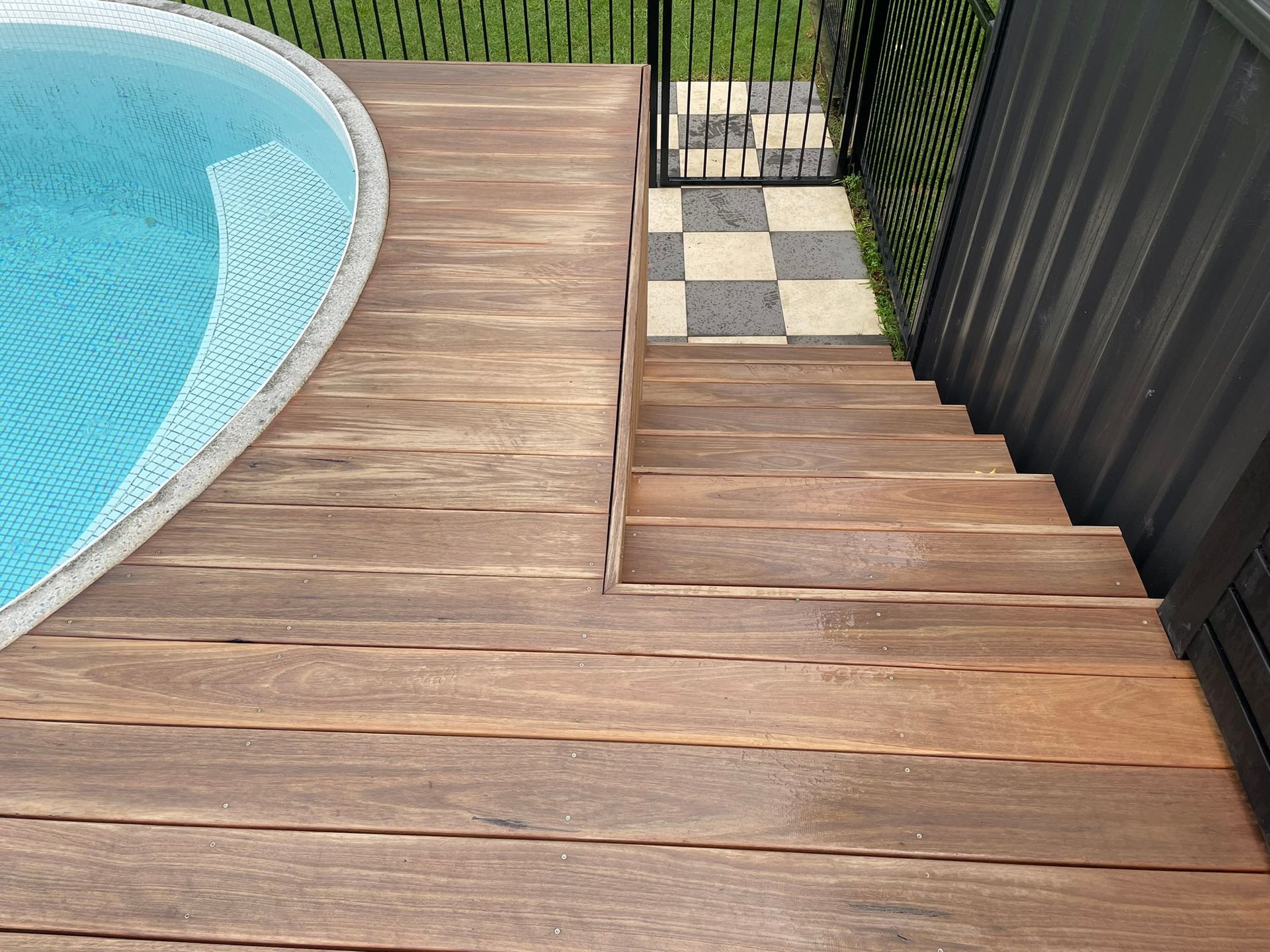 An Empty Room with Stairs Leading up To It — Tradewind Building Maintenance in Woonona,NSW