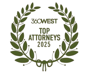 A laurel wreath with the words top attorneys 2025 on it