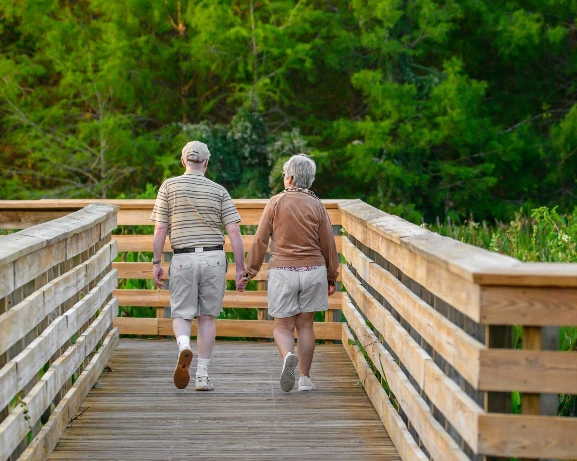Older man and woman walking