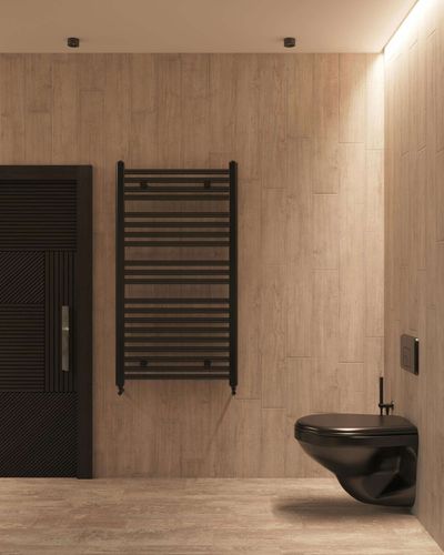 A bathroom with a black toilet and a black towel rack