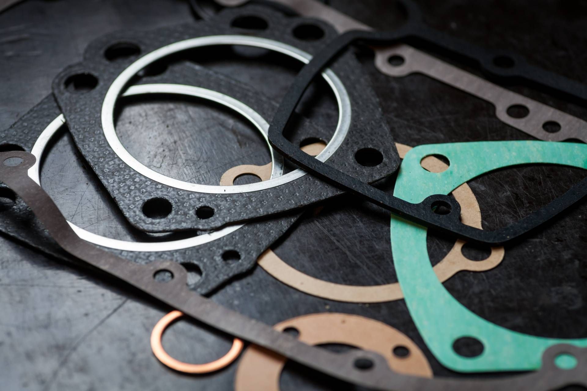 Various engine gaskets on a workbench near Cincinnati, Ohio