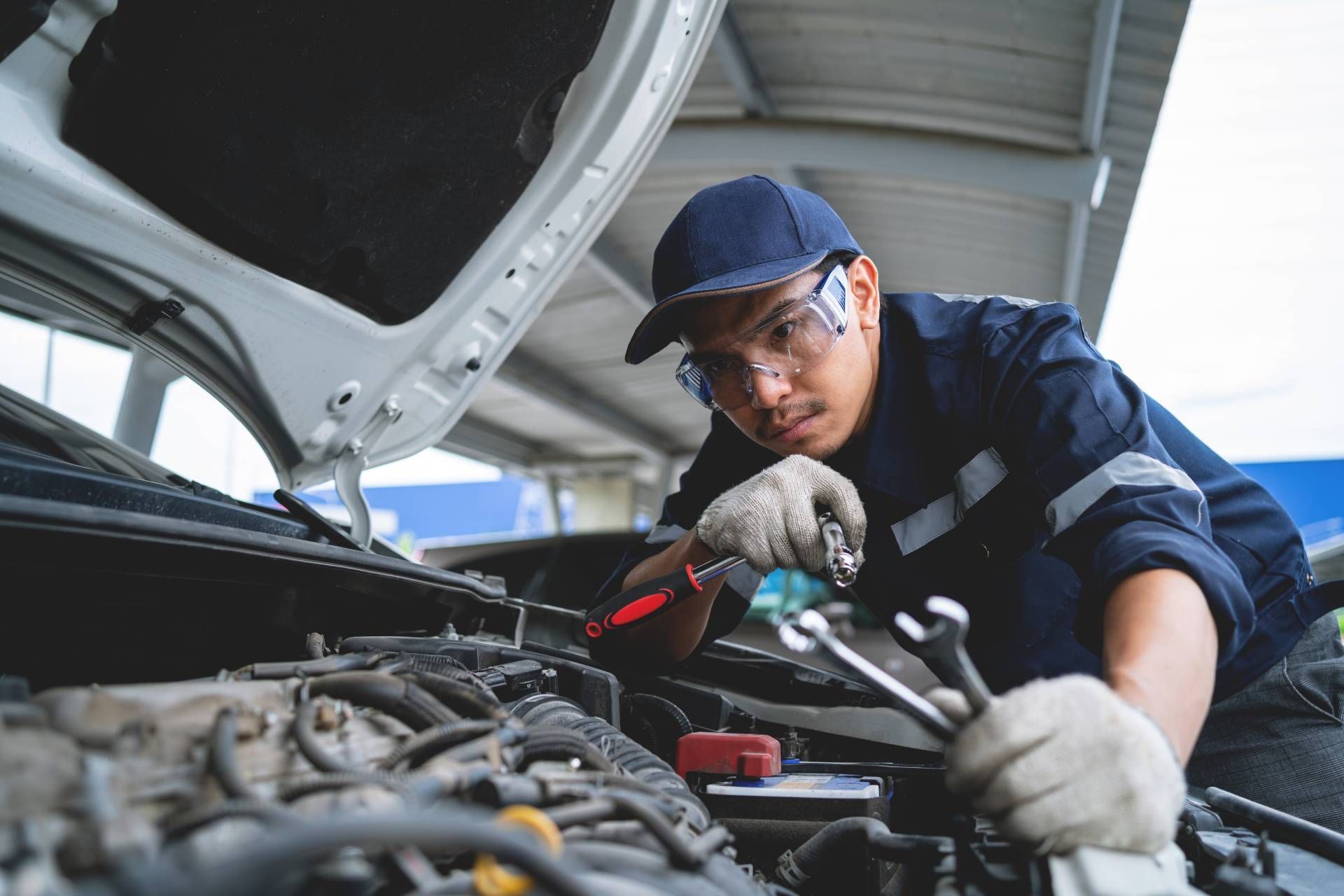 Transmission specialist near Cincinnati, OH, working on an older transmission