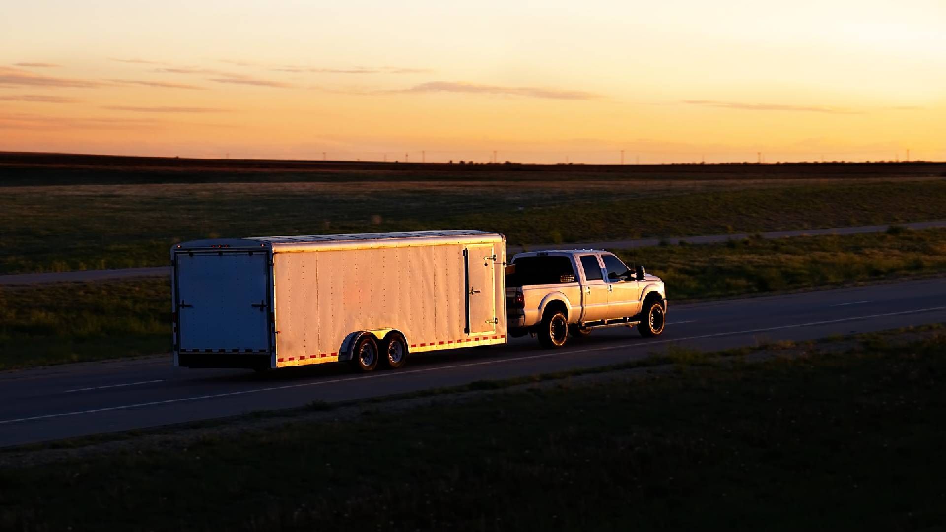 A pickup truck towing a trailer near Cincinnati, OH