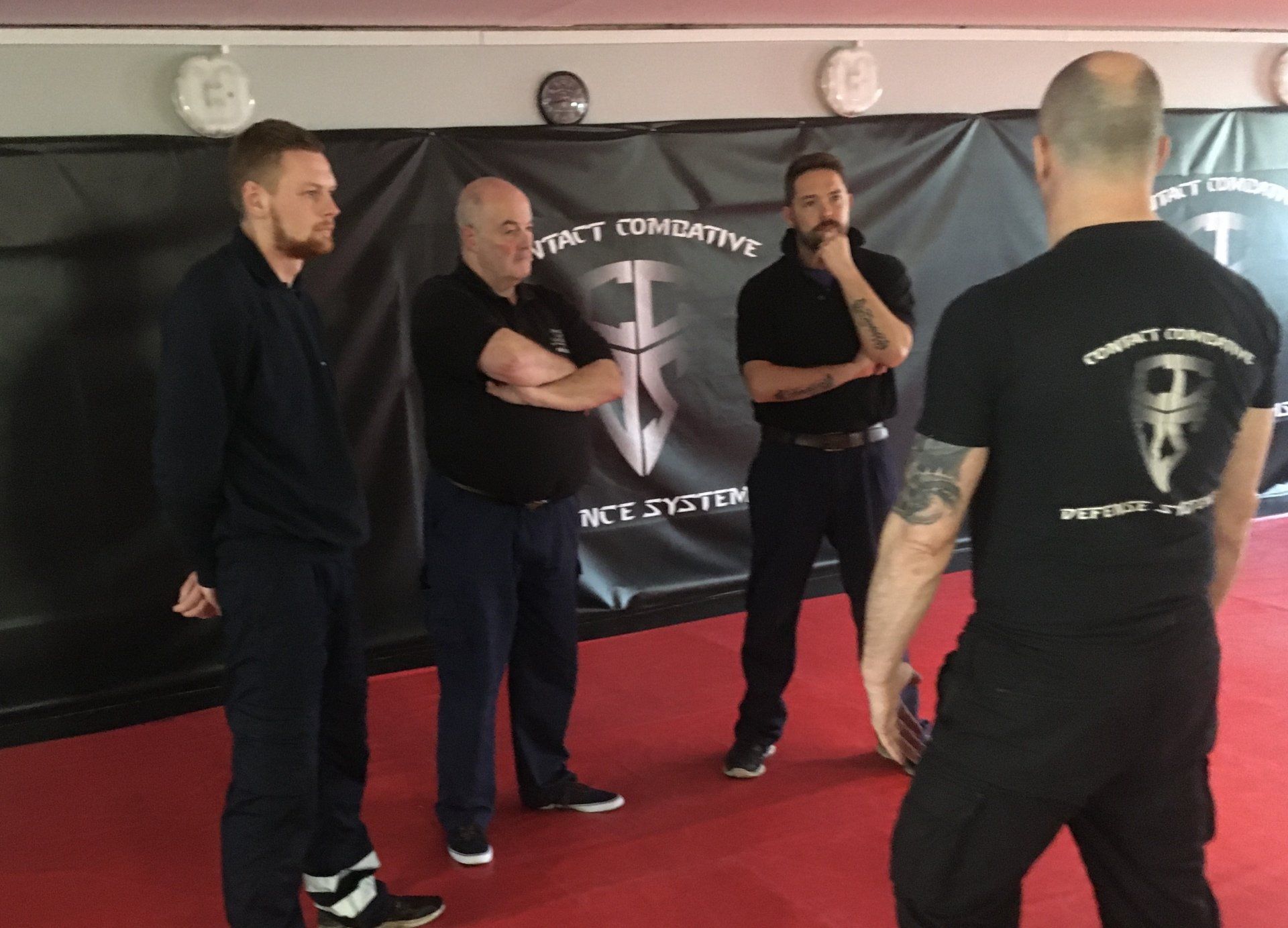 Three students, one instructor, self defence course at Contact Combative Defence Systems Larne venue