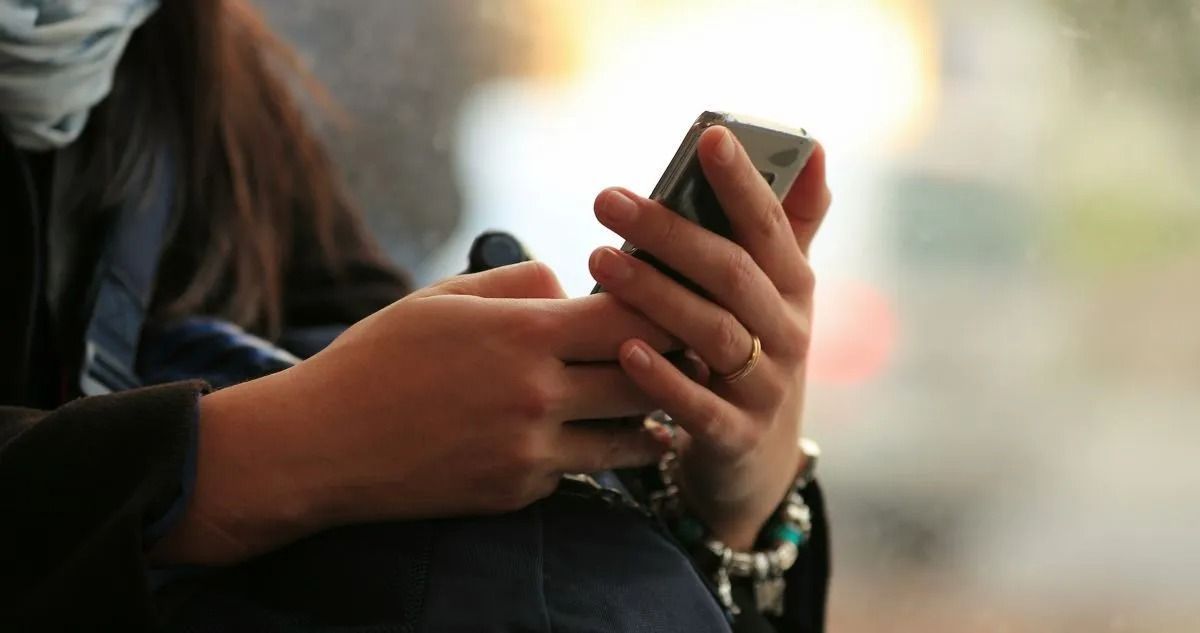 close up of person holding a phone