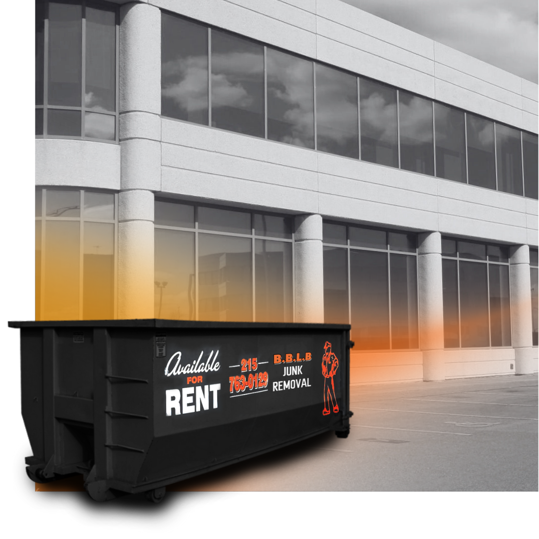 a 20 cubic yard BBLB Dumpster in front of a building
