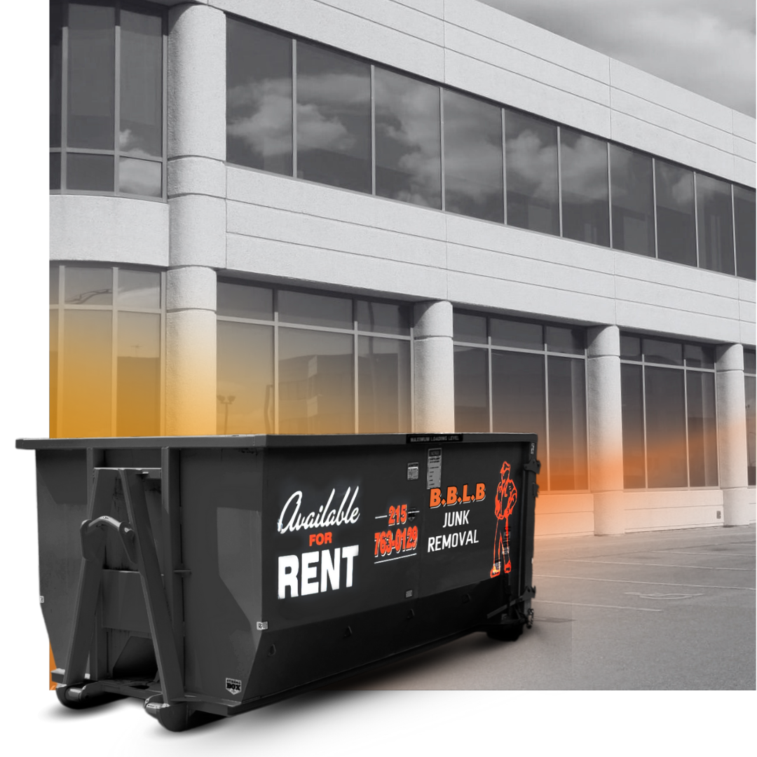 a 20 cubic yard BBLB Dumpster in front a building