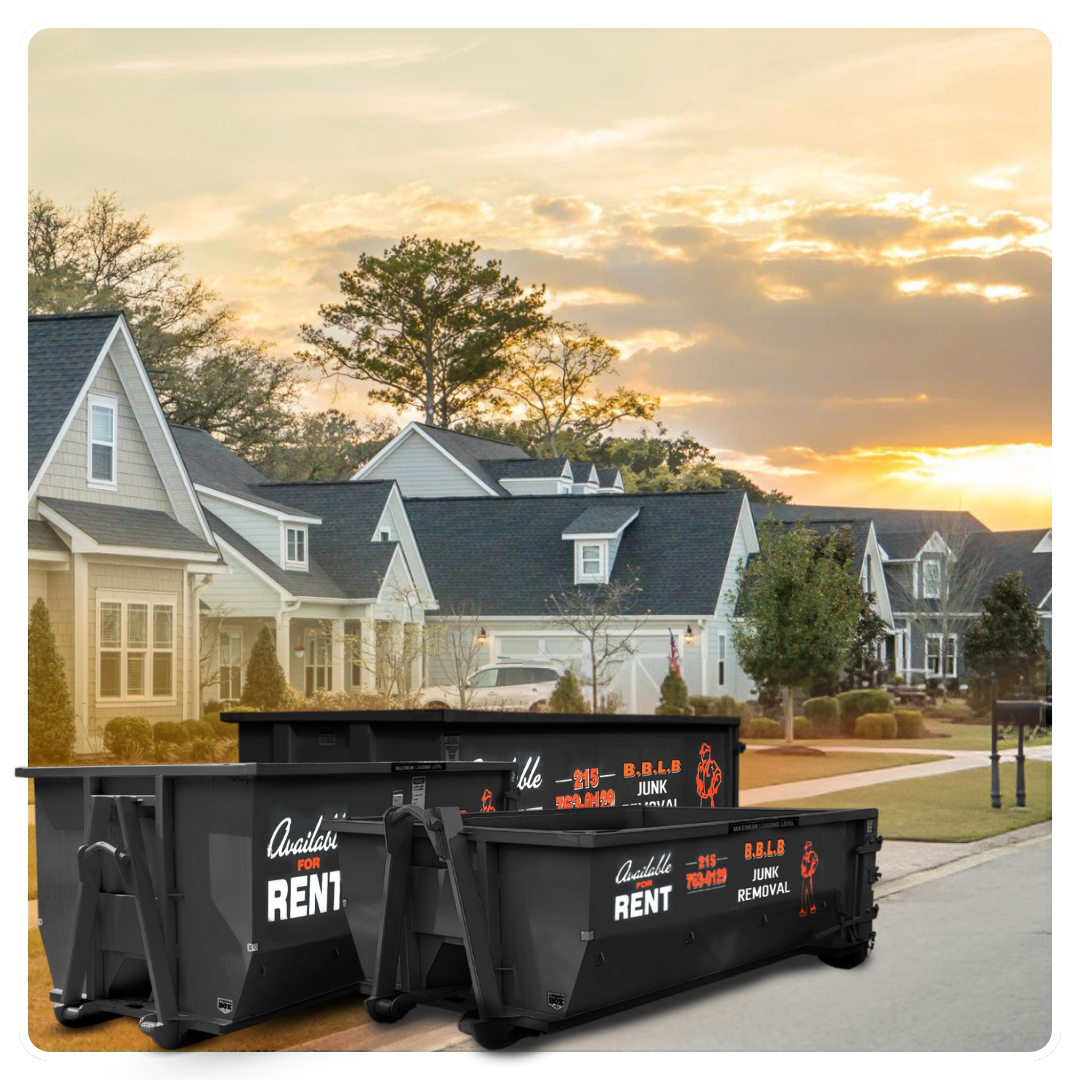 Three BBLB dumpsters in front of a house