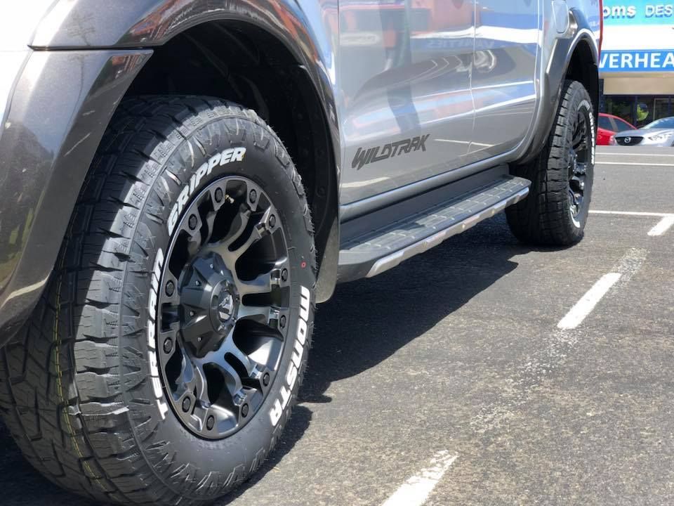 A Pickup Truck Is Parked In A Parking Lot — Torque Tyres & Trailer Spares Mackay in Mackay, QLD
