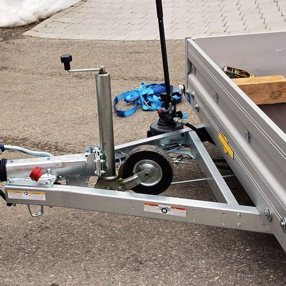 A Trailer Is Parked On The Side Of The Road