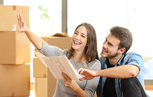 Couple planning decoration when moving home - Movers in Morristown, TN