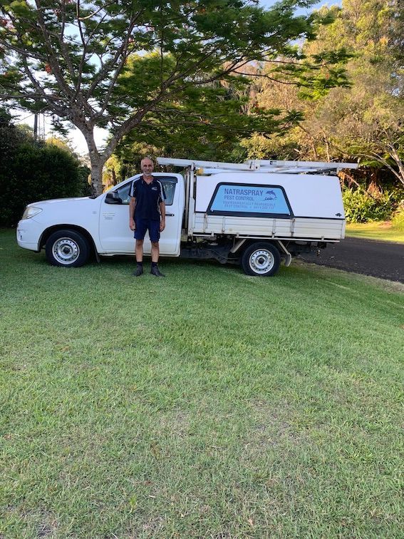 Tony Standing in Front of The Work Ute — Natraspray Lismore in Goonellabah, NSW