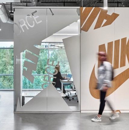 Image of a Nike campus with people walking from one place to another