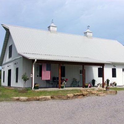 House painted in white — Versailles, MO — Martin Structures