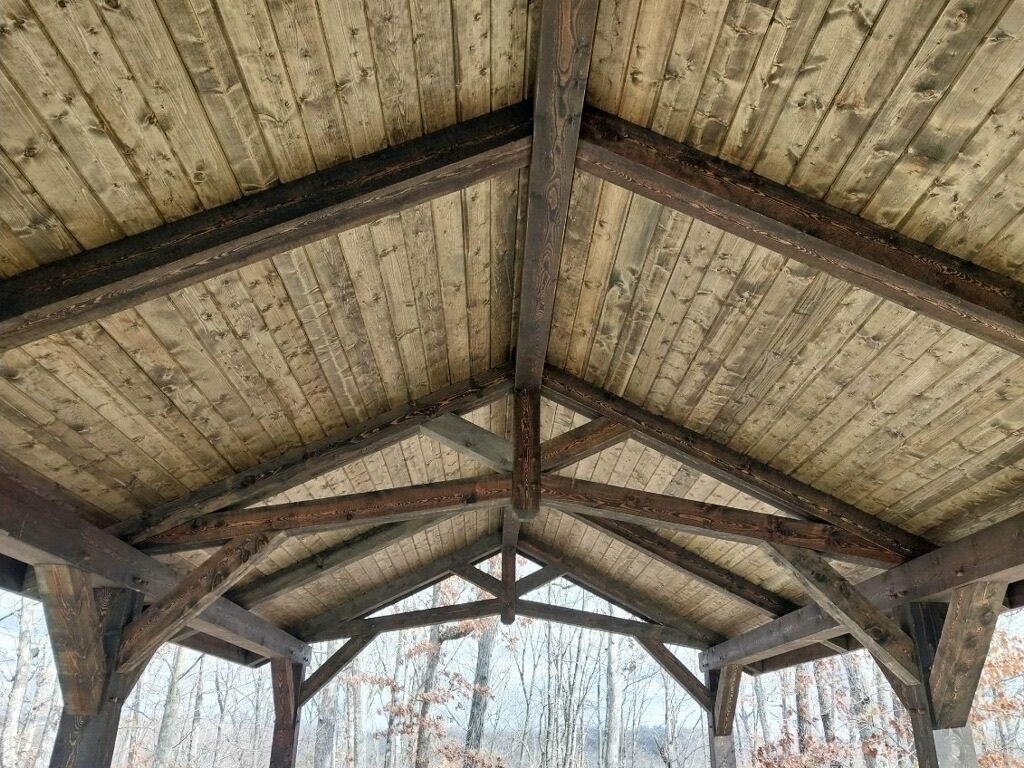 Timber Frame RV Storage Build with Tongue and Groove Ceiling and exposed Timber Beams.