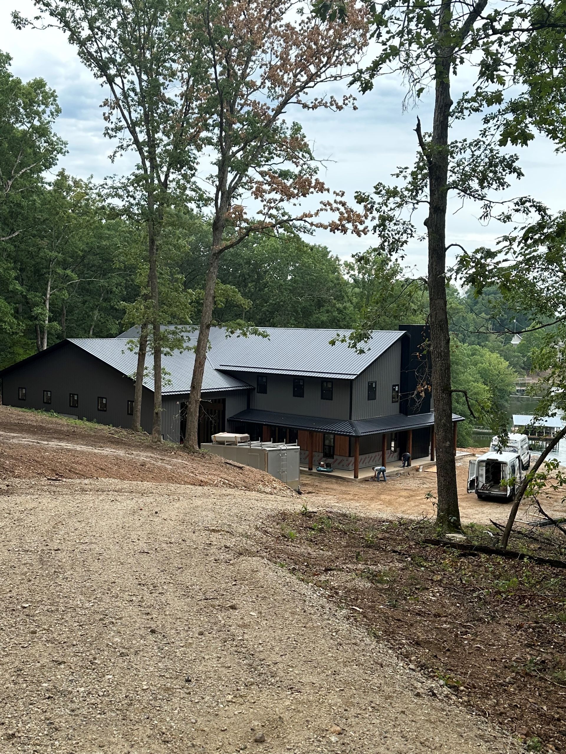 Black house in the forest — Versailles, MO — Martin Structures