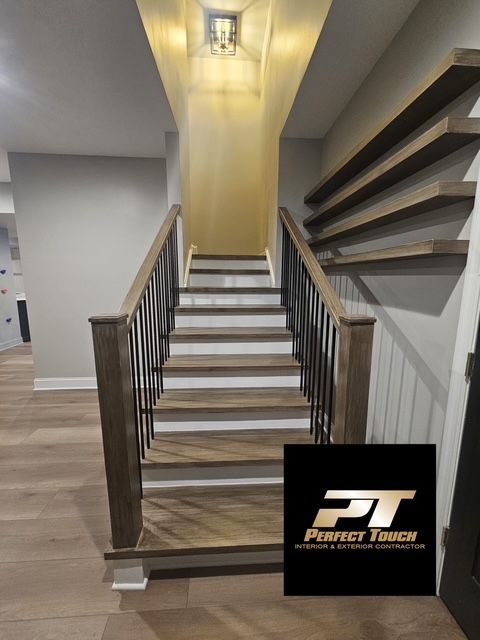 A picture of a staircase with a perfect touch logo