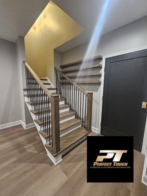 A picture of a staircase with a perfect touch logo in the corner