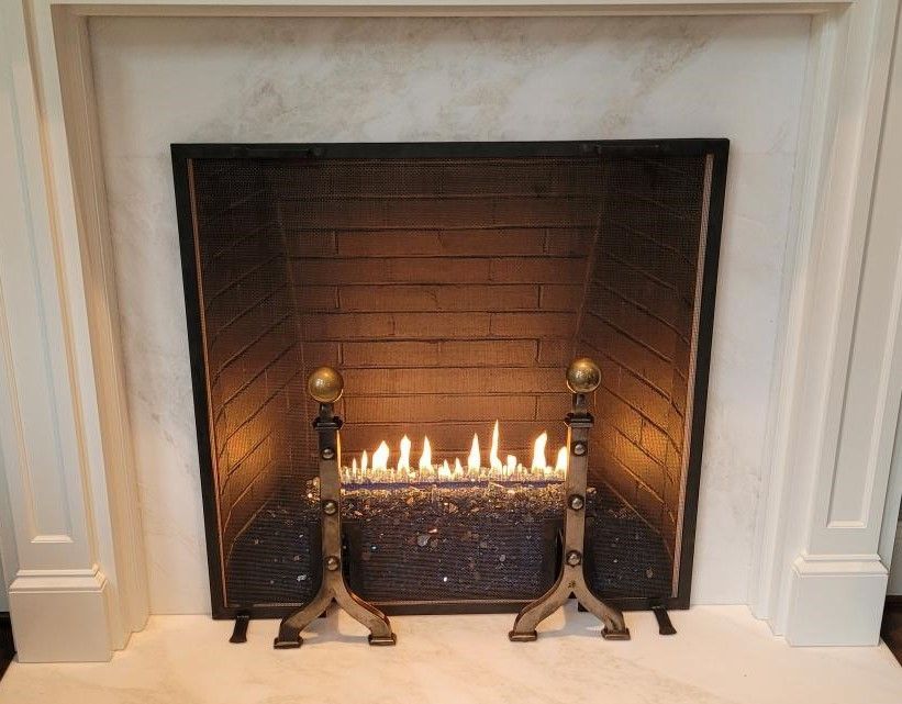 A fireplace with a fire coming out of it - Glen Burnie, MD - McAllister Plumbing Inc.
