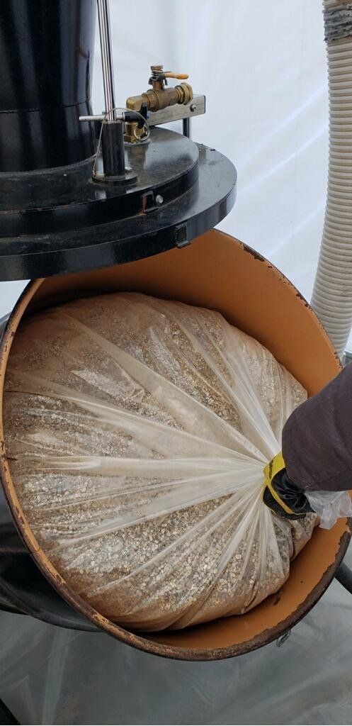 Asbestos Contaminated Material Bagged