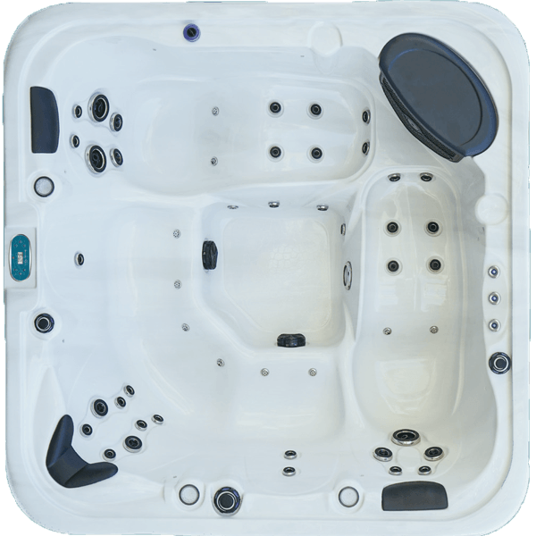 Un jacuzzi blanc avec des taches noires dessus