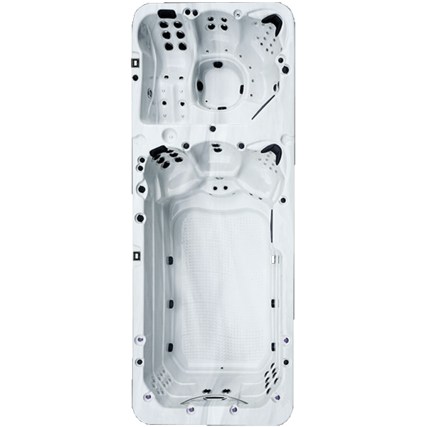 Une grande piscine blanche est posée sur une surface blanche.