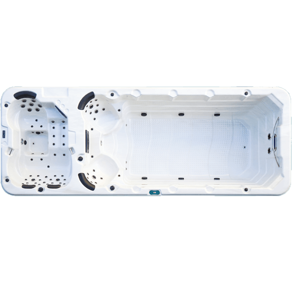 Une grande piscine blanche avec un bain à remous attaché sur un fond blanc.