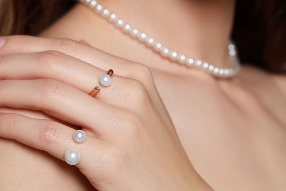Close Up Shot Of Woman Wearing Pearls Necklace And Ring - Jewellers in Dubbo, NSW