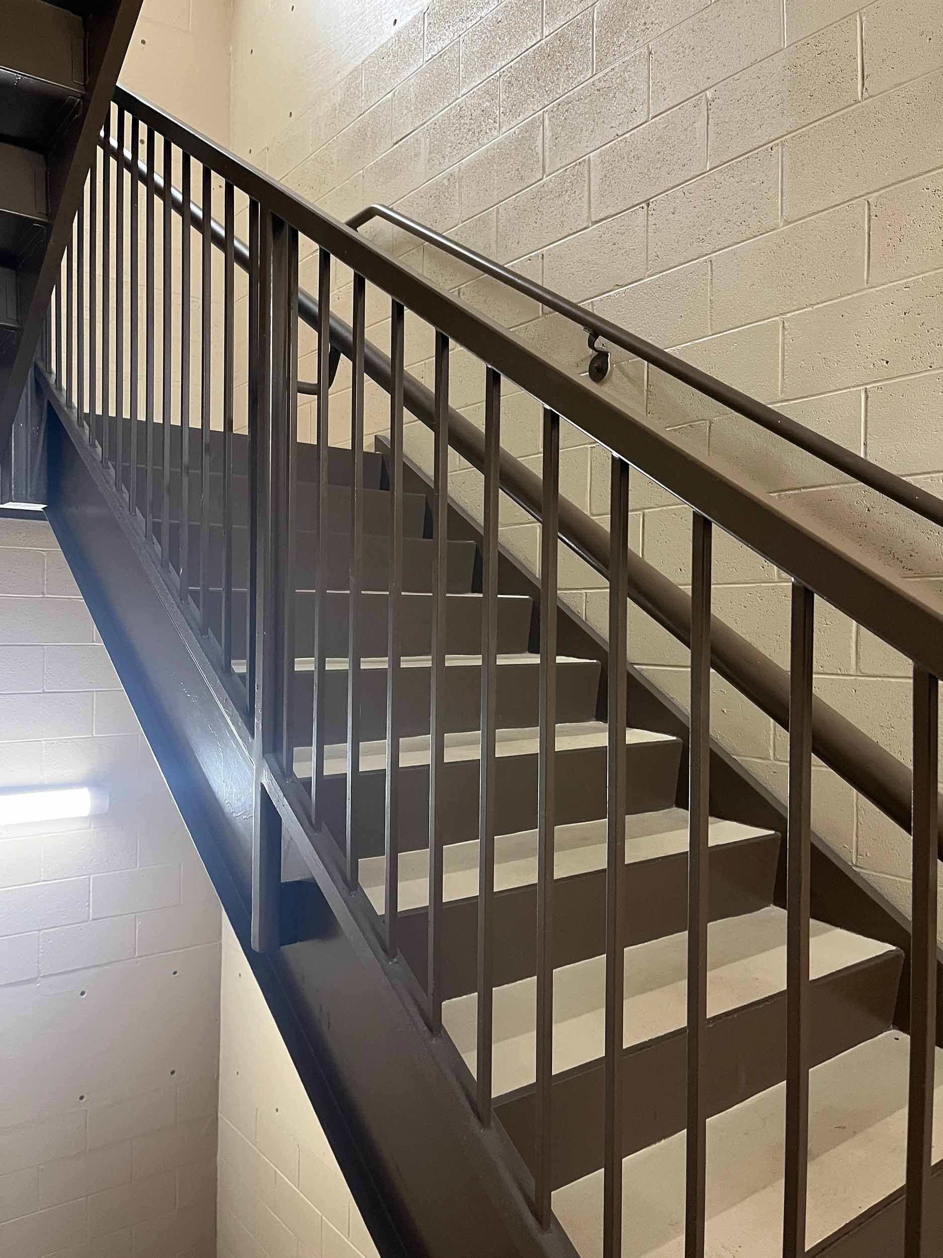 Oro Valley industrial fire escape staircase on a white wall