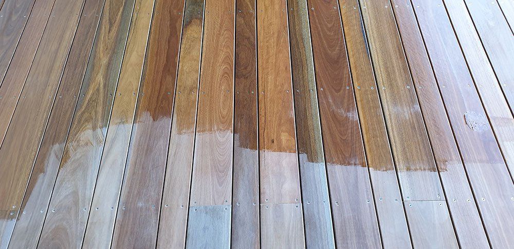 Wooden Deck Varnish Before — Licensed Builders in Rockhampton, QLD